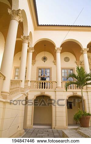 Businessman standing in the balcony, Biltmore Hotel, Coral Gables, Florida, USA View Large Photo Image Stock Photograph - Businessman standing in the balcony, Biltmore Hotel, Coral Gables, Florida, USA. Fotosearch