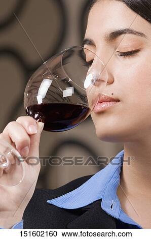 Businesswoman drinking wine View Large Photo Image Stock Image - Businesswoman drinking wine. Fotosearch