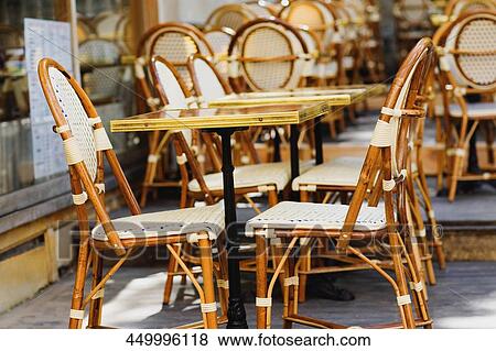 Chairs and a table in a restaurant View Large Photo Image Stock Photo - Chairs and a table in a restaurant. Fotosearch