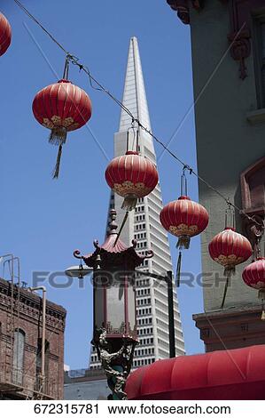 Chinese lanterns hanging on a rope, Transamerica Pyramid, Chinatown, San Francisco, California, USA View Large Photo Image Stock Image - Chinese lanterns hanging on a rope, Transamerica Pyramid, Chinatown, San Francisco, California, USA. Fotosearch