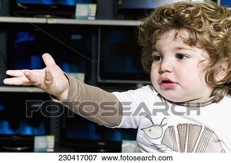 Close-up of a baby boy View Large Photo Image Stock Photo - Close-up of a baby boy. Fotosearch
