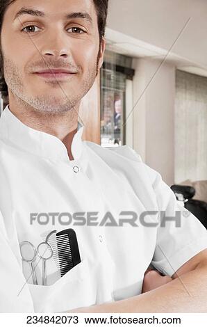 Close-up of a barber with scissors and a comb in his pocket View Large Photo Image Stock Image - Close-up of a barber with scissors and a comb in his pocket. Fotosearch