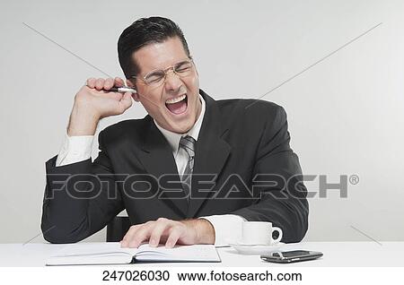 Close-up of a businessman shouting View Large Photo Image Stock Image - Close-up of a businessman shouting. Fotosearch