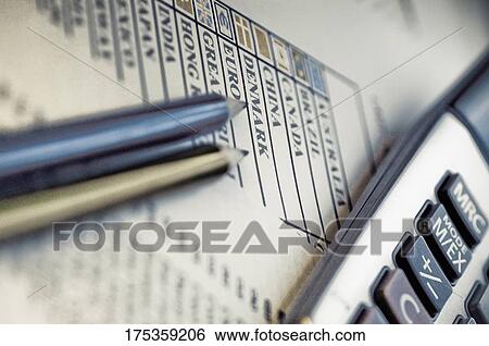 Close-up of a calculator and two pencils on papers View Large Photo Image Stock Photograph - Close-up of a calculator and two pencils on papers. Fotosearch