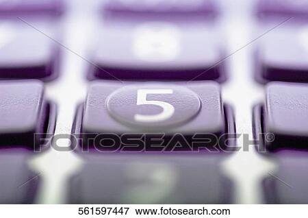 Stock Photo - Close-up of a calculator keypad with focus on number 5. Fotosearch