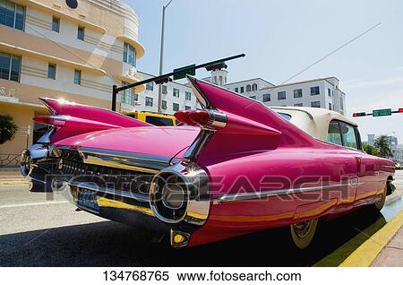 Close-up of a car on the road, Miami, Florida, USA View Large Photo Image Stock Photography - Close-up of a car on the road, Miami, Florida, USA. Fotosearch