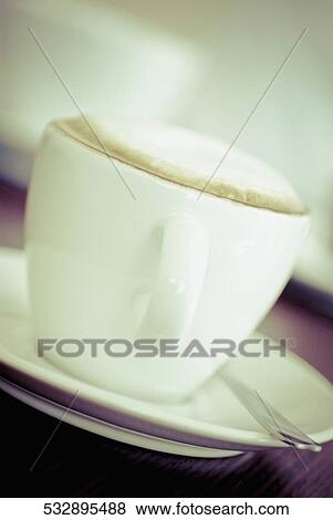 Close-up of a coffee cup View Large Photo Image Stock Photo - Close-up of a coffee cup. Fotosearch
