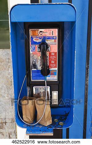 Close-up of a coin operated telephone booth View Large Photo Image Stock Photograph - Close-up of a coin operated telephone booth. Fotosearch