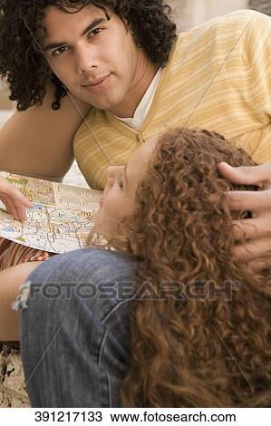 Close-up of a couple relaxing, Biltmore Hotel, Coral Gables, Florida, USA View Large Photo Image Stock Image - Close-up of a couple relaxing, Biltmore Hotel, Coral Gables, Florida, USA. Fotosearch