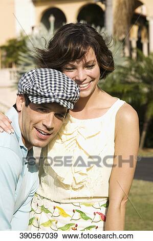 Close-up of a couple romancing in a hotel lawn, Biltmore Hotel, Coral Gables, Florida, USA View Large Photo Image Stock Photo - Close-up of a couple romancing in a hotel lawn, Biltmore Hotel, Coral Gables, Florida, USA. Fotosearch