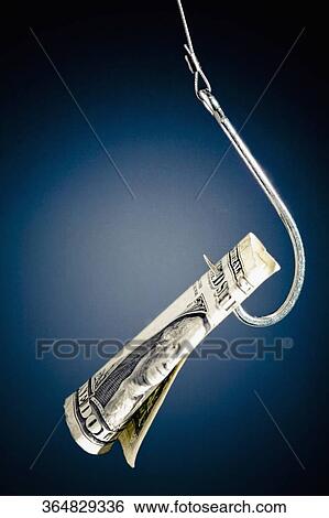 Close-up of a dollar bill hanging from a fishing hook View Large Photo Image Stock Photograph - Close-up of a dollar bill hanging from a fishing hook. Fotosearch