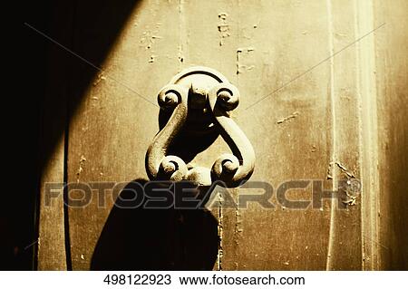 Close-up of a door knocker View Large Photo Image Stock Image - Close-up of a door knocker. Fotosearch