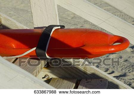 Stock Photo - Close-up of a float on a wooden staircase on the beach, Miami, Florida, USA. Fotosearch