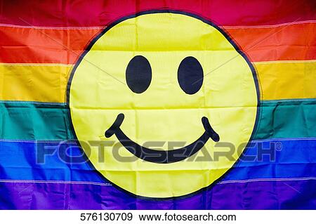 Stock Photo - Close-up of a gay pride flag with a smiley face, Washington DC, USA. Fotosearch