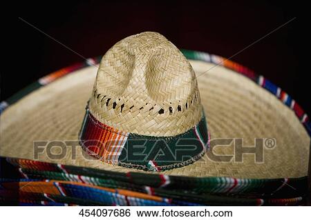 Stock Photograph - Close-up of a hat at a market stall. Fotosearch