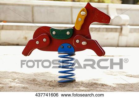Stock Photograph - Close-up of a horse spring ride. Fotosearch