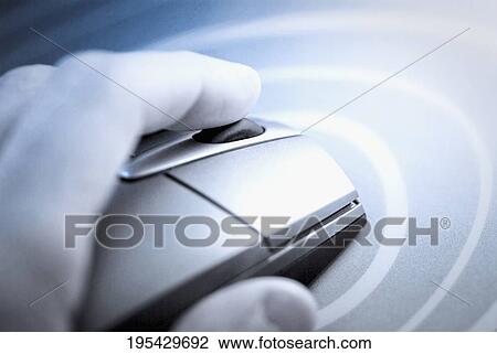 Close-up of a human hand holding a computer mouse View Large Photo Image Stock Image - Close-up of a human hand holding a computer mouse. Fotosearch