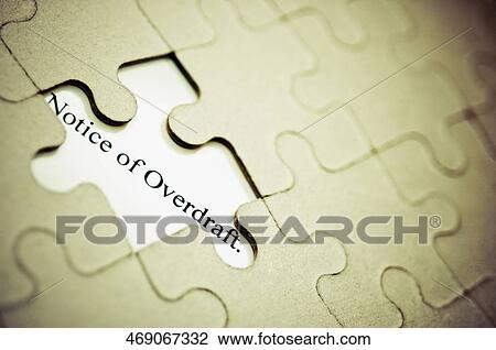 Close-up of a jigsaw puzzle with a notice of overdraft View Large Photo Image Stock Image - Close-up of a jigsaw puzzle with a notice of overdraft. Fotosearch