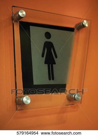 Close-up of a ladies lavatory sign View Large Photo Image Picture - Close-up of a ladies lavatory sign. Fotosearch