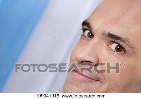Close-up of a man smiling View Large Photo Image Stock Photography - Close-up of a man smiling. Fotosearch