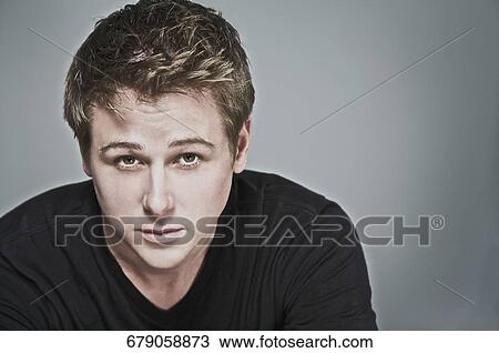 Close-up of a man staring View Large Photo Image Stock Image - Close-up of a man staring. Fotosearch