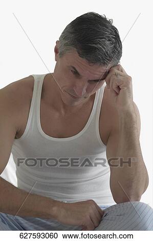 Close-up of a man thinking View Large Photo Image Stock Image - Close-up of a man thinking. Fotosearch