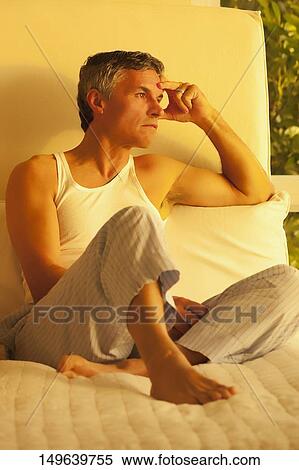 Close-up of a man thinking View Large Photo Image Stock Photography - Close-up of a man thinking. Fotosearch