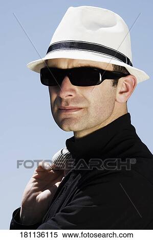 Stock Photography - Close-up of a man wearing sunglasses, Los Angeles, California, USA. Fotosearch