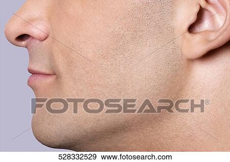 Close-up of a man's face View Large Photo Image Stock Photo - Close-up of a man's face. Fotosearch