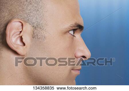Close-up of a man's face View Large Photo Image Stock Photography - Close-up of a man's face. Fotosearch
