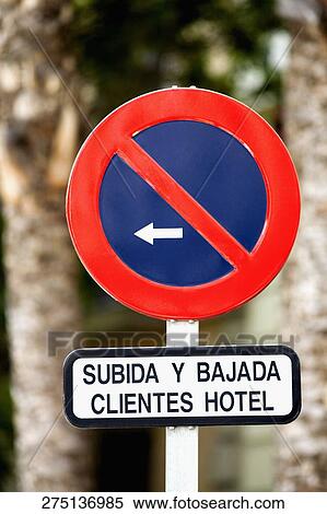 Close-up of a no parking sign with an arrow sign View Large Photo Image Stock Photography - Close-up of a no parking sign with an arrow sign. Fotosearch