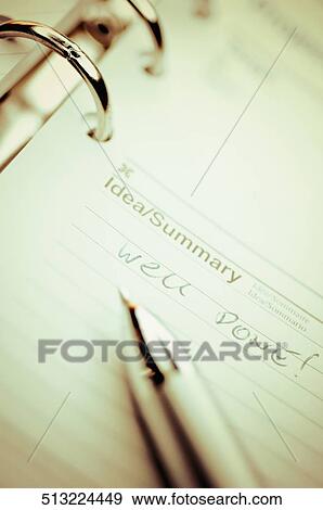 Close-up of a pen on a personal organizer View Large Photo Image Stock Photo - Close-up of a pen on a personal organizer. Fotosearch