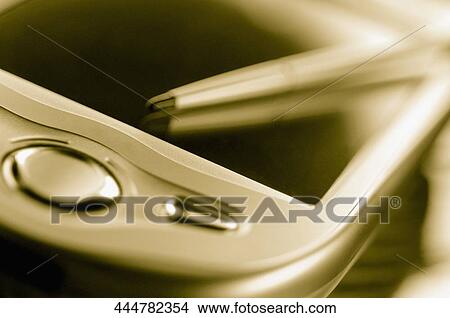 Close-up of a personal data assistant with a stylus View Large Photo Image Picture - Close-up of a personal data assistant with a stylus. Fotosearch