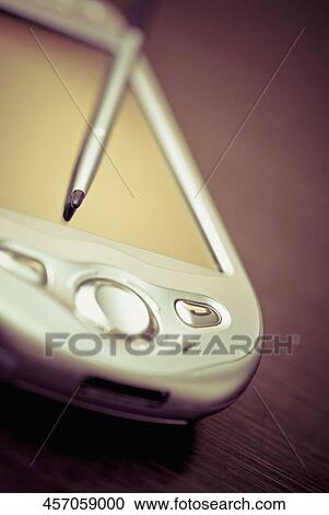 Close-up of a personal data assistant View Large Photo Image Stock Image - Close-up of a personal data assistant. Fotosearch