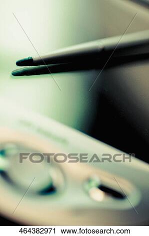 Close-up of a personal data assistant with a stylus View Large Photo Image Stock Image - Close-up of a personal data assistant with a stylus. Fotosearch