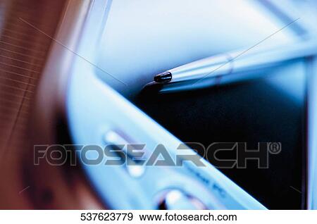 Close-up of a personal data assistant with a stylus View Large Photo Image Stock Photo - Close-up of a personal data assistant with a stylus. Fotosearch