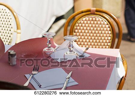 Close-up of a place setting in a restaurant View Large Photo Image Stock Photograph - Close-up of a place setting in a restaurant. Fotosearch