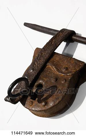 Close-up of a rusty lock with a key View Large Photo Image Stock Photo - Close-up of a rusty lock with a key. Fotosearch