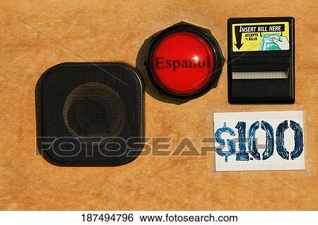 Stock Photograph - Close-up of a self service payment machine with Spanish translator, Santa Monica, Los Angeles County, California, USA. Fotosearch