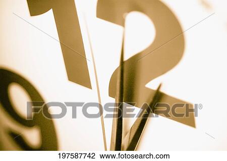 Stock Image - Close-up of a wall clock. Fotosearch
