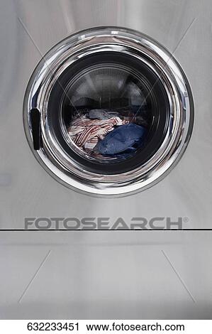 Close-up of a washing machine View Large Photo Image Stock Image - Close-up of a washing machine. Fotosearch