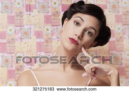 Close-up of a woman day dreaming View Large Photo Image Stock Image - Close-up of a woman day dreaming. Fotosearch