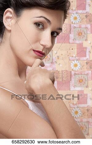 Close-up of a woman day dreaming View Large Photo Image Stock Image - Close-up of a woman day dreaming. Fotosearch