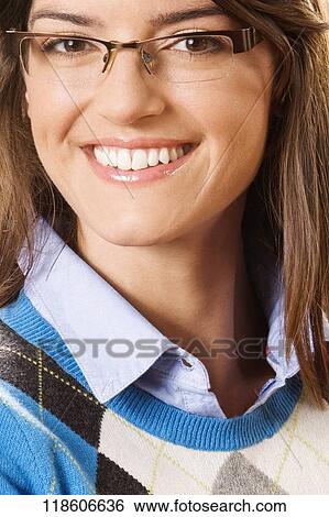 Close-up of a woman smiling View Large Photo Image Stock Photograph - Close-up of a woman smiling. Fotosearch
