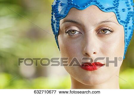 Stock Photo - Close-up of a woman wearing swimming cap, Biltmore Hotel, Coral Gables, Florida, USA. Fotosearch