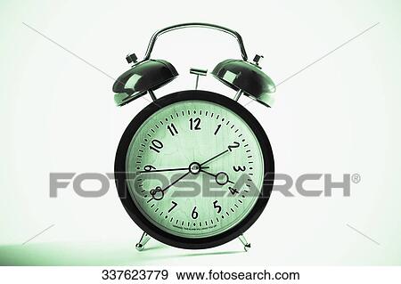 Close-up of an alarm clock View Large Photo Image Stock Photo - Close-up of an alarm clock. Fotosearch