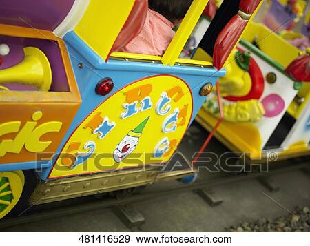 Stock Photo - Close-up of an amusement park train. Fotosearch
