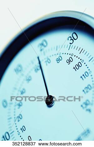 Stock Photo - Close-up of an analog thermometer. Fotosearch