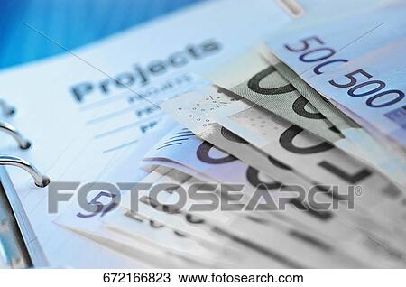 Close-up of European union banknotes on a spiral notebook View Large Photo Image Stock Image - Close-up of European union banknotes on a spiral notebook. Fotosearch