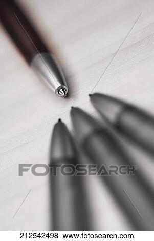 Close-up of four ballpoint pens View Large Photo Image Stock Photo - Close-up of four ballpoint pens. Fotosearch